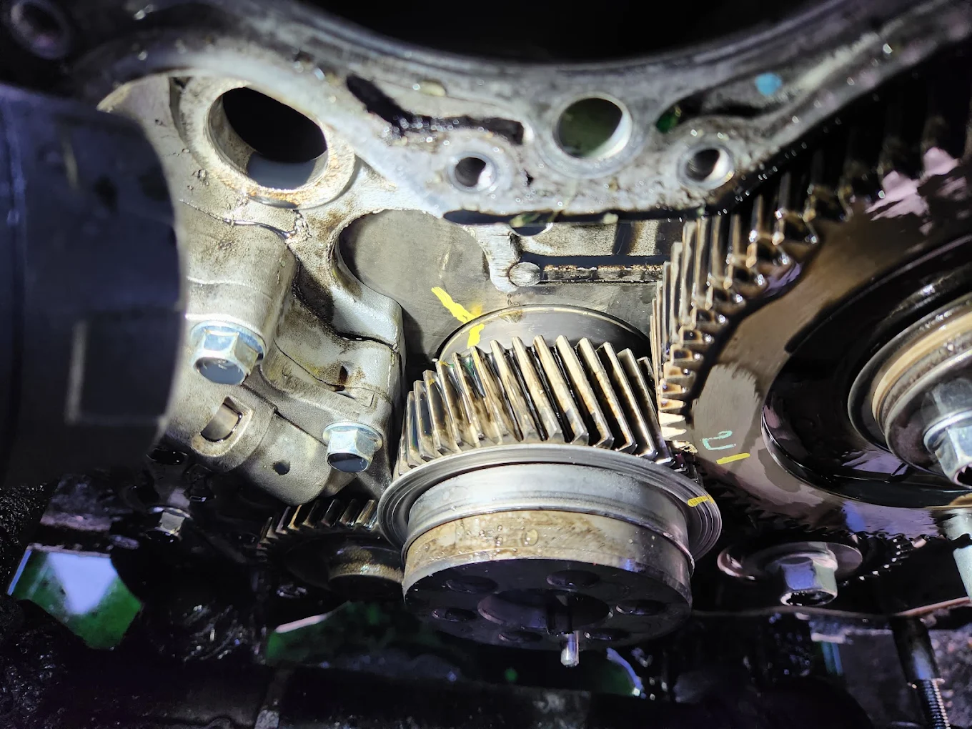 Close-up of camshaft drive gear during a timing job